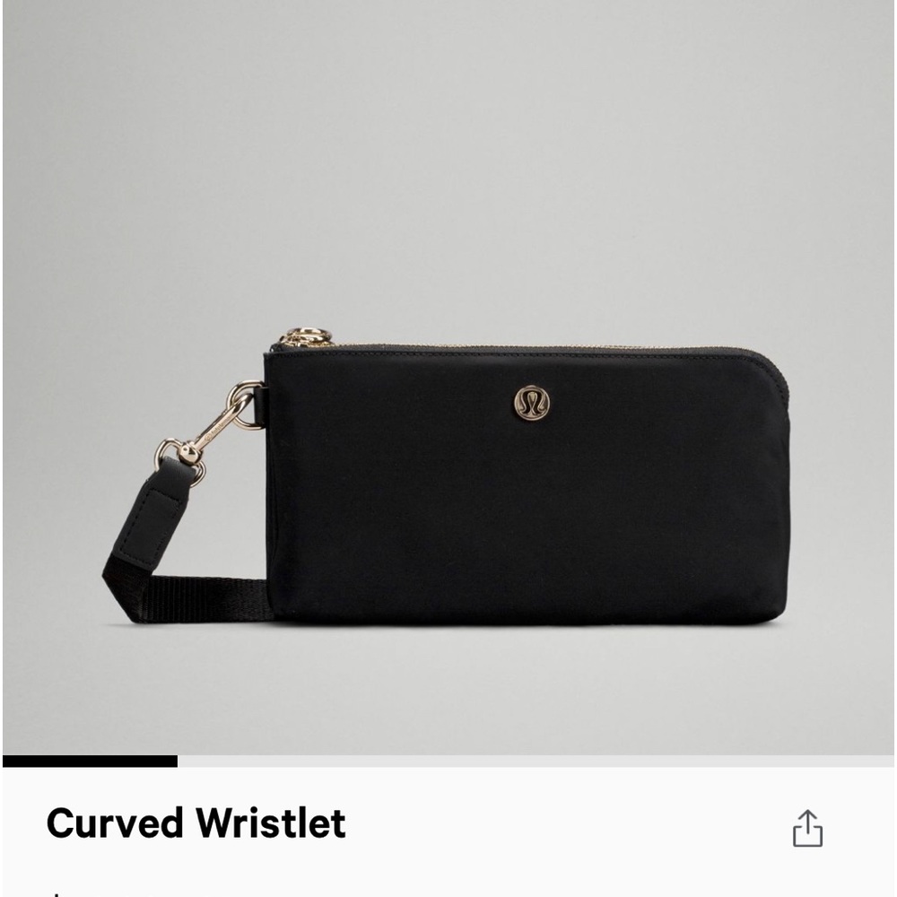 Black curved wristlet from Lululemon. Like new